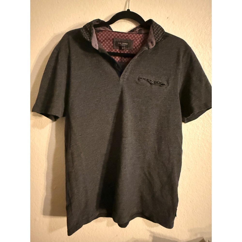 Ted baker gray  polo with details around the hem